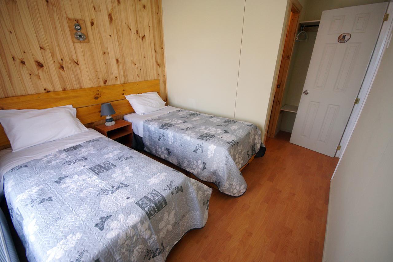 Hostal Los Pioneros Пуерто-Наталес Екстер'єр фото