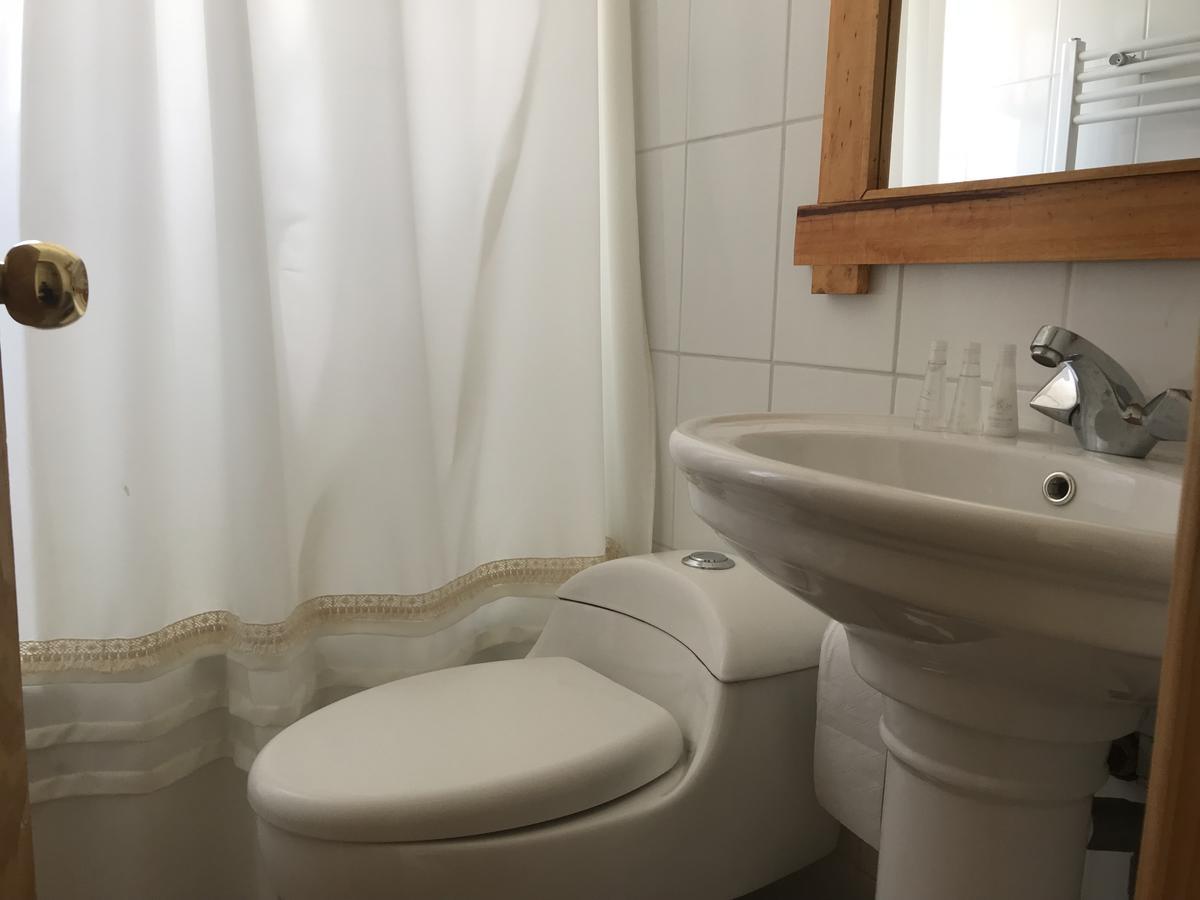 Hostal Los Pioneros Пуерто-Наталес Екстер'єр фото
